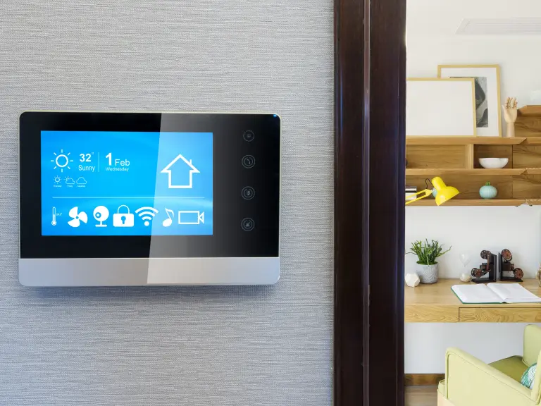 Smart home control panel, living room in the background